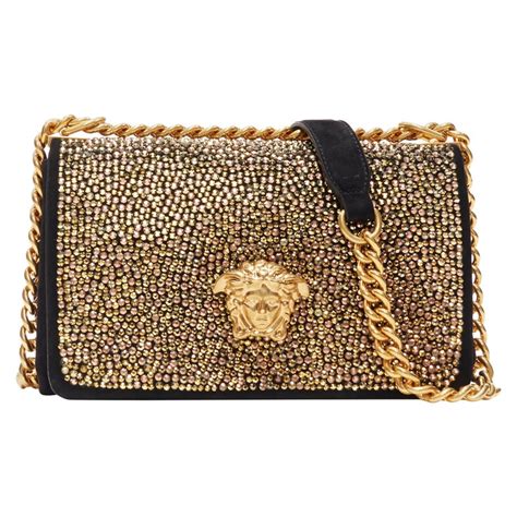 versace black gold bag|Versace gold chain bag.